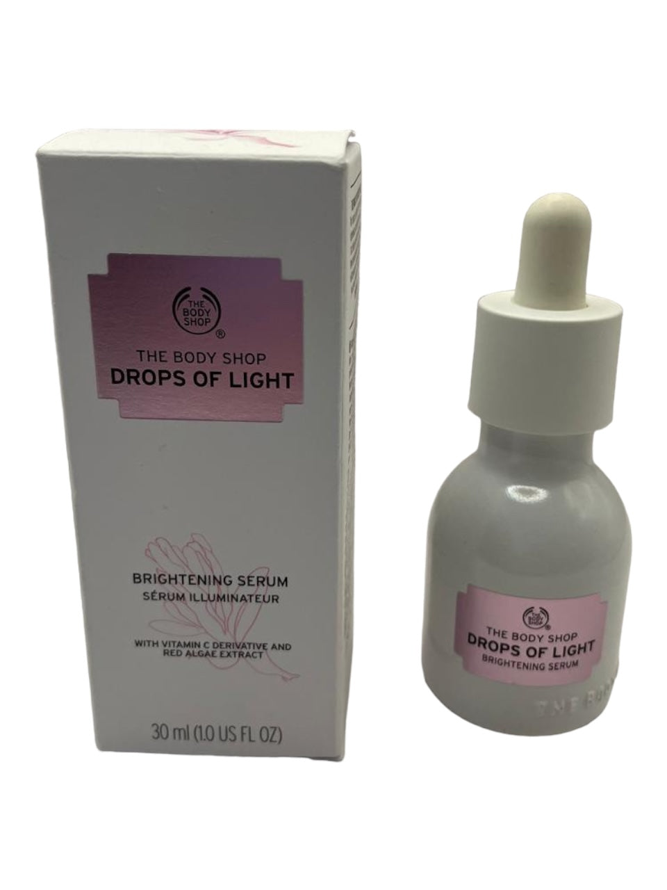 The Body Shop                                    Drops of light, serum  iluminador, 30 ml